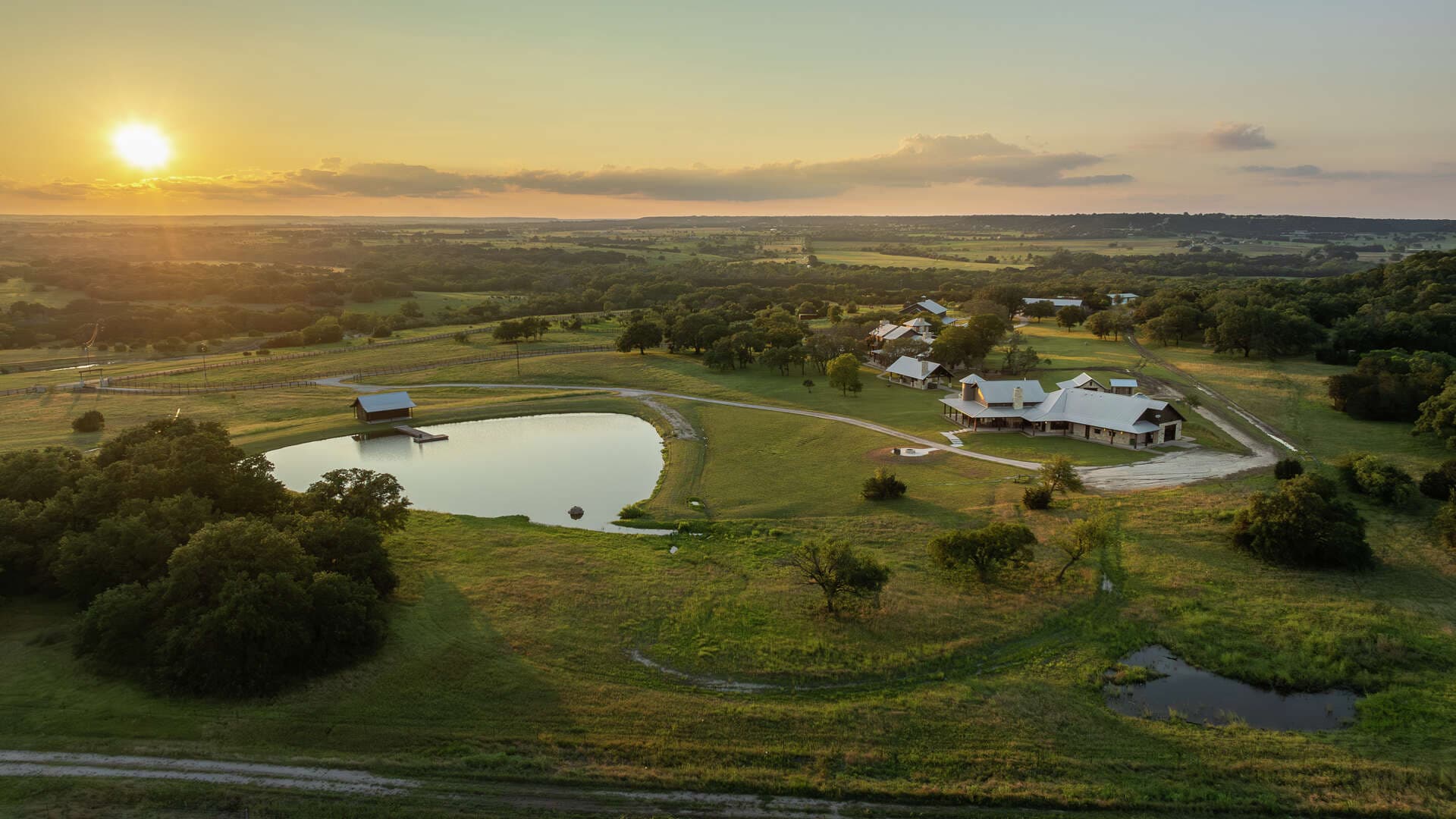 Texas ranch land — wide open acreage with warm horizon light